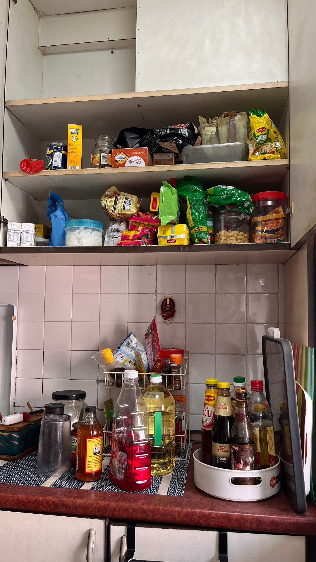 Cluttered kitchen shelf before The Space Edit